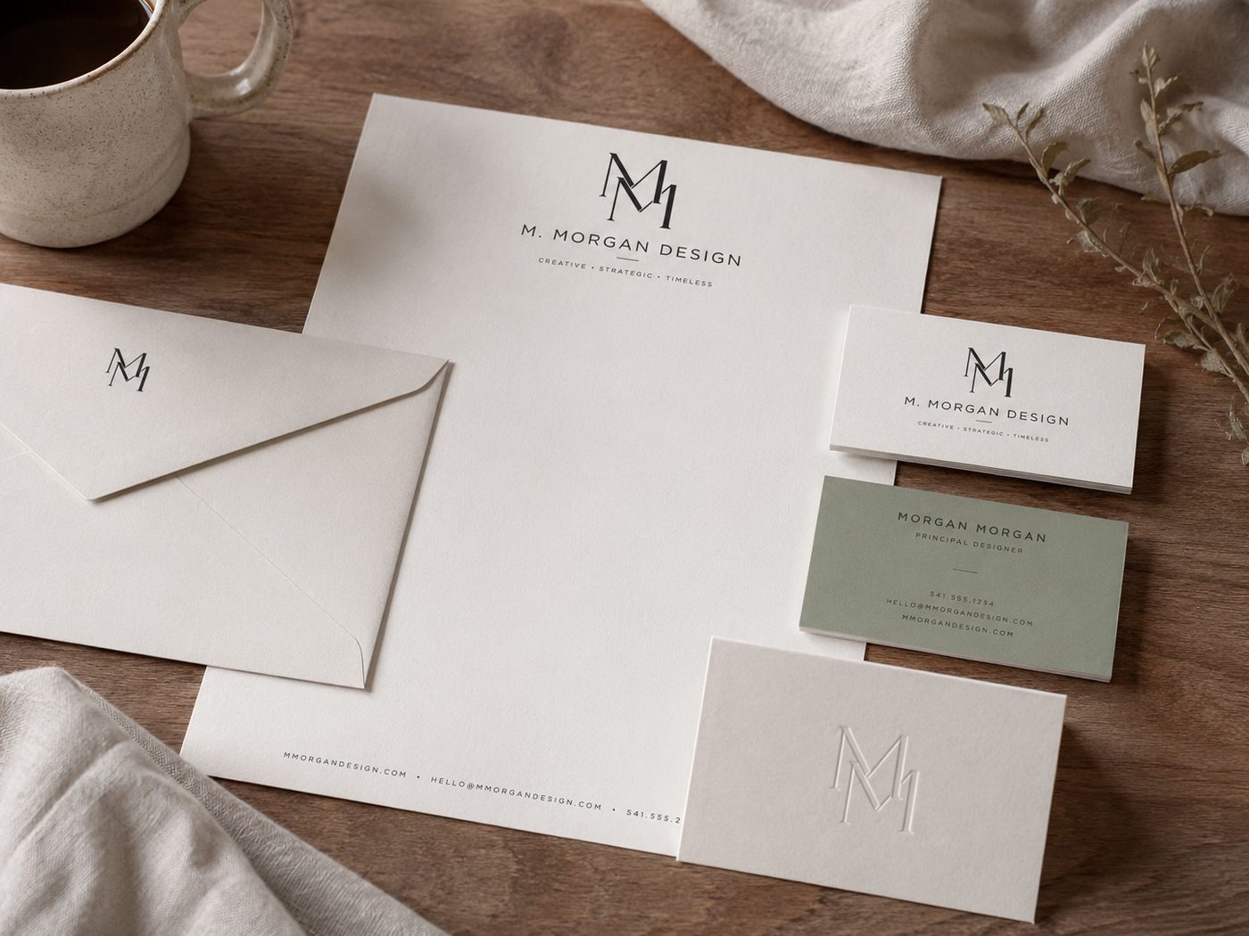 Branding and logo design flat lay with sketchbook, business cards, stationery, color palette, and paper textures